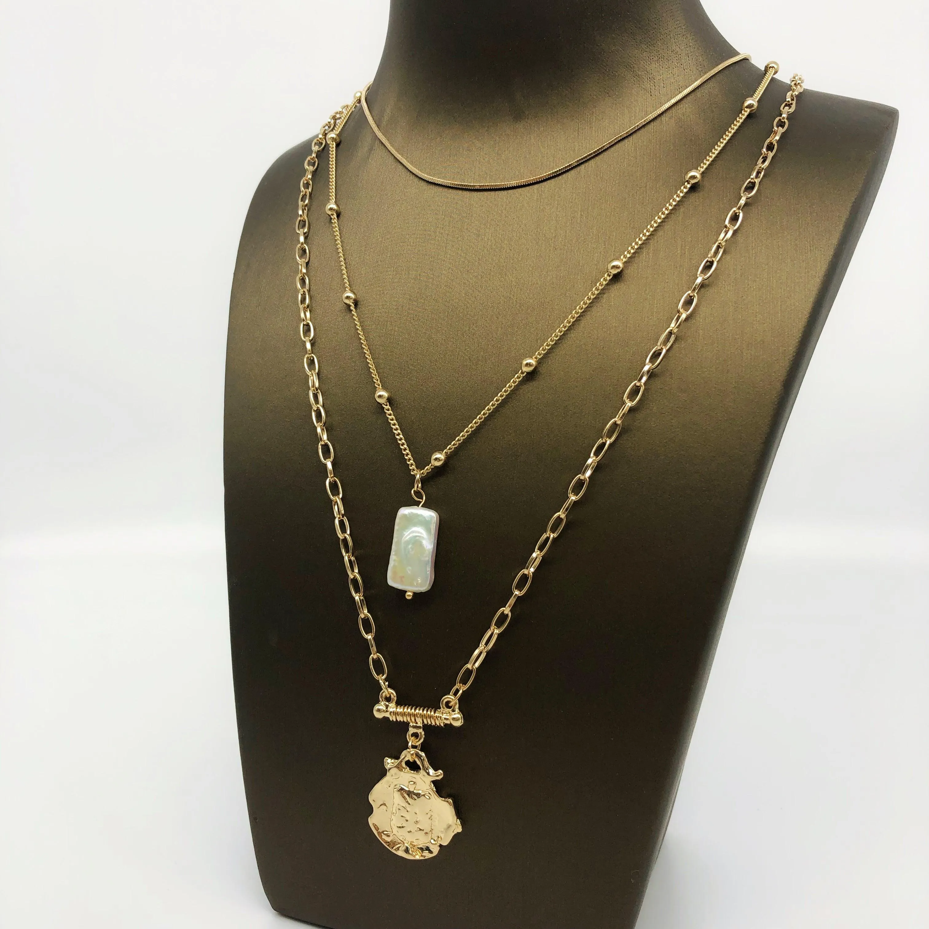 Three Layer Necklace with Simulated Pearl and Gold Pendant
